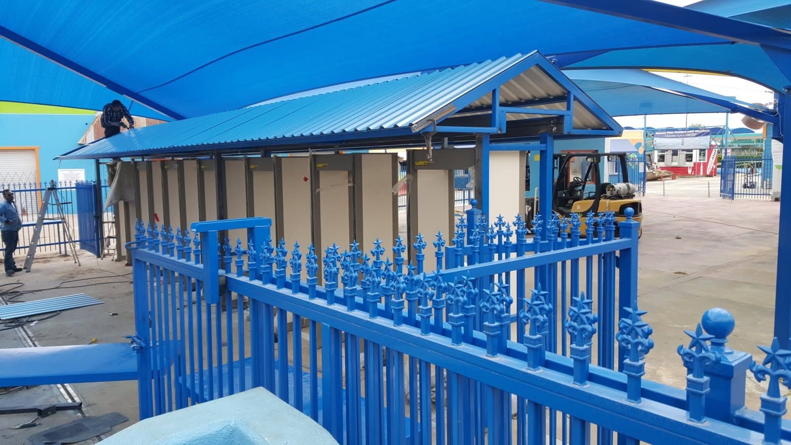 Steel entrance canopy and iron fencing installed at Hurricane Harbor, Arlington, TX
