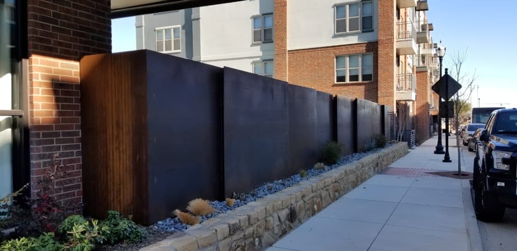 Corten steel wall and fireplace fabricated for an apartment complex in Roanoke, TX