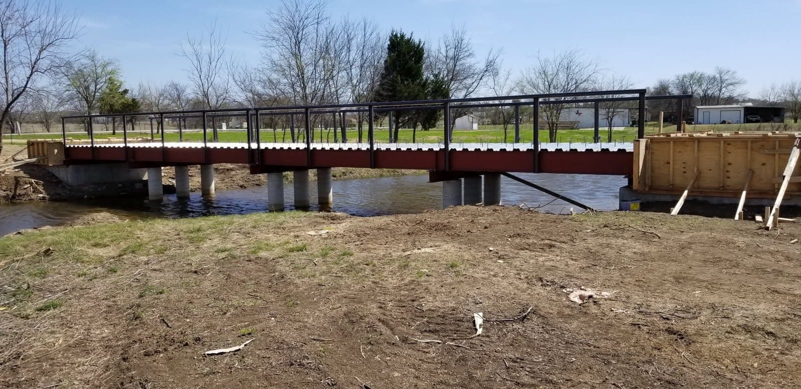 Custom steel driveway bridge, side view